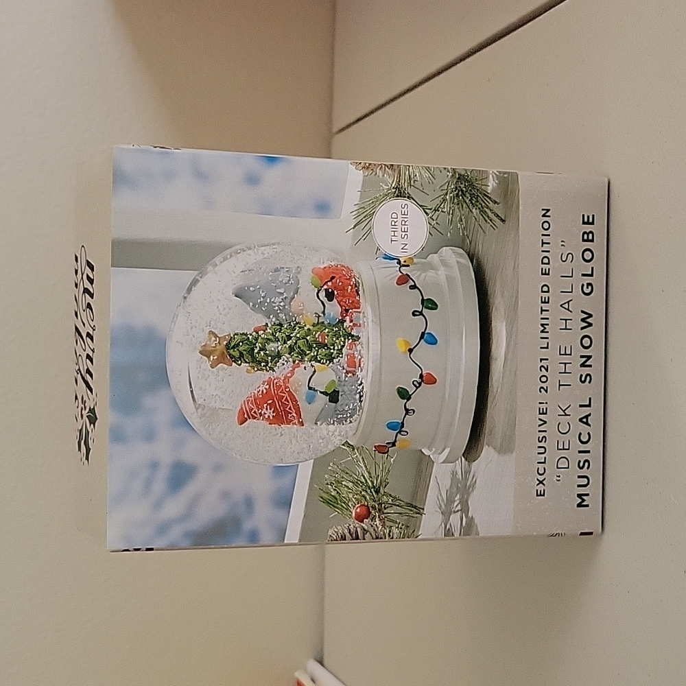 Brand new Deck the Hall Music Snow Globe.